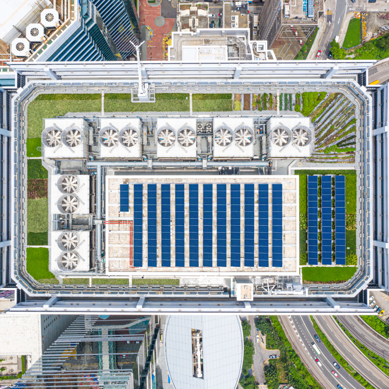 Aerial view of building with solar panels
