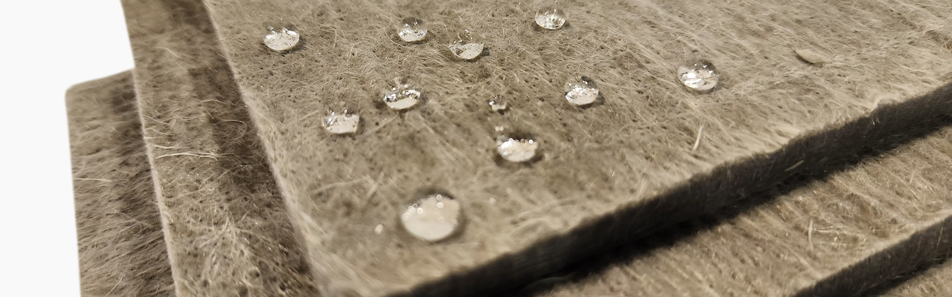 Water droplets on ArmaGel XGH display material's superior hydrophobicity performance